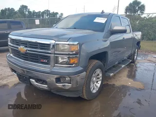 2015 Chevrolet Silverado 1500 LT with VIN 3GCUKREC8FG535021, listed as a IAAI auction lot 42154626 with 125,897 mi miles and . Bid and sale history available at DreamBid. Image 2.