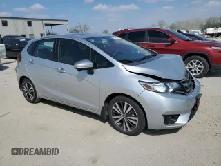2015 Honda Fit EX with VIN 3HGGK5G89FM744818, listed as a Copart auction lot 52977685 with 99,719 mi miles and Clean title. Bid and sale history available at DreamBid. Image 4.