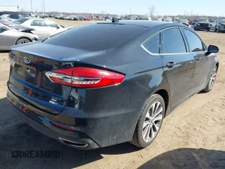 2020 Ford Fusion SE with VIN 3FA6P0T96LR179655, listed as a IAAI auction lot 41796399 with 54,089 mi miles and . Bid and sale history available at DreamBid. Image 4.