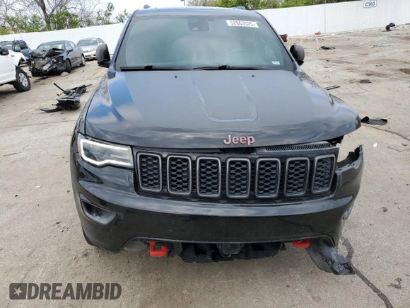 2021 Jeep Grand Cherokee Trailhawk with VIN 1C4RJFLG7MC599693, listed as a Copart auction lot 52863525 with 95,289 mi miles and Salvage Title. Bid and sale history available at carsss.com. Image 5.