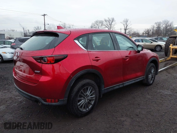 2019 Mazda CX-5 Sport with VIN JM3KFBBM7K1574764, listed as a IAAI auction lot 41276424 with 28,901 mi miles and . Bid and sale history available at carsss.com. Image 4.