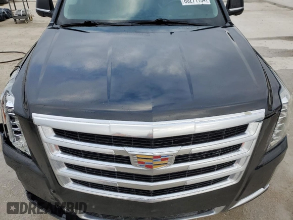 2018 Cadillac Escalade Luxury z VIN 1GYS3BKJ3JR370626, wystawiony jako Copart lot #86271134 z przebiegiem Nie podano mil oraz Szkody całkowita. Historia ofert i sprzedaży dostępna na DreamBid. Obrazek 12.