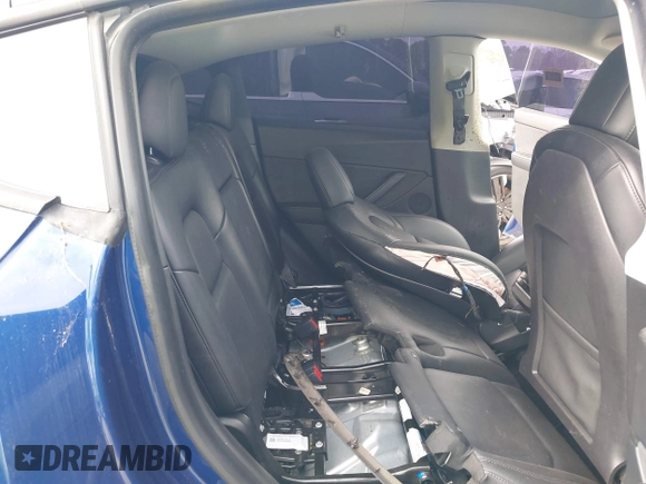 2021 Tesla Model Y Standard Range with VIN 5YJYGDED8MF122985, listed as a IAAI auction lot 41430423 with 120,302 mi miles and . Bid and sale history available at carsss.com. Image 8.