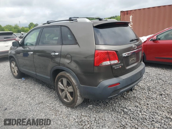 2012 Kia Sorento EX z VIN 5XYKU3A69CG279061, wystawiony jako Copart lot #60088605 z przebiegiem 272 332 mil mil oraz Czysty tytuł • Clean title. Historia ofert i sprzedaży dostępna na DreamBid. Obrazek 2.