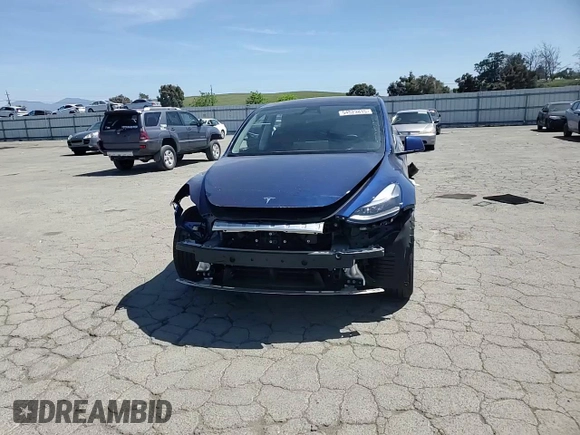 2024 Tesla Model Y Long Range z VIN 7SAYGAEE3RF034699, wystawiony jako Copart lot #54523815 z przebiegiem 9 764 mil mil oraz Szkoda całkowita • Salvage title. Historia ofert i sprzedaży dostępna na DreamBid. Obrazek 14.