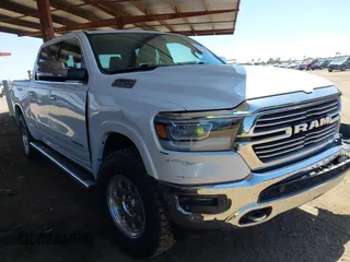 2021 Ram 1500 Laramie with VIN 1C6SRFJT8MN524720, listed as a IAAI auction lot 42312109 with 43,929 mi miles and . Bid and sale history available at DreamBid. Image 1.