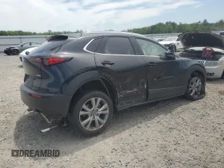 2022 Mazda CX-30 S Premium with VIN 3MVDMBDL2NM428998, listed as a Copart auction lot 57803465 with 49,090 mi miles and Salvage title. Bid and sale history available at DreamBid. Image 3.