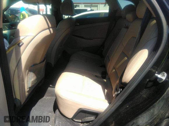 2016 Hyundai Tucson Limited with VIN KM8J33A24GU262163, listed as a IAAI auction lot 41866929 with 65,309 mi miles and . Bid and sale history available at DreamBid. Image 8.