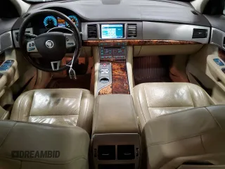 2009 Jaguar XF with VIN SAJXA06B69HR25287, listed as a Copart auction lot 42179625 with 222,124 mi miles and Salvage Title. Bid and sale history available at DreamBid. Image 8.