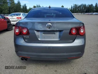 2008 Volkswagen Jetta GLI z VIN 3VWDJ71KX8M006725, wystawiony jako Copart lot #58665965 z przebiegiem 182 427 mil mil oraz Tytuł czysty. Historia ofert i sprzedaży dostępna na DreamBid. Obrazek 6.