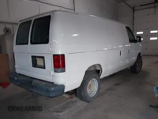 2012 Ford Econoline Cargo Recreational with VIN 1FTNE2EW8CDA86753, listed as a IAAI auction lot 42506770 with 303,617 mi miles and . Bid and sale history available at DreamBid. Image 4.