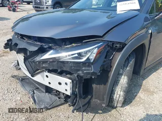 2021 Lexus UX 250h F Sport z VIN JTHE9JBHXM2045377, wystawiony jako IAAI lot #42580566 z przebiegiem 52 838 mil mil oraz . Historia ofert i sprzedaży dostępna na DreamBid. Obrazek 18.