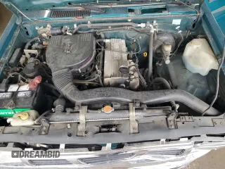 1997 Nissan Frontier XE with VIN 1N6SD16SXVC346717, listed as a Copart auction lot 55442215 with 112,343 mi miles and Salvage title. Bid and sale history available at DreamBid. Image 11.