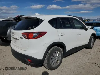 2015 Mazda CX-5 Touring with VIN JM3KE4CY7F0553862, listed as a Copart auction lot 48392725 with 122,530 mi miles and Salvage Title. Bid and sale history available at carsss.com. Image 3.