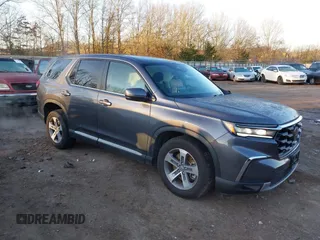 2023 Honda Pilot EX-L z VIN 5FNYG1H59PB041758, wystawiony jako IAAI lot #41201520 z przebiegiem 12 828 mil mil oraz . Historia ofert i sprzedaży dostępna na DreamBid. Obrazek 1.