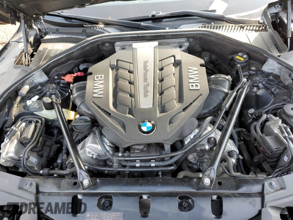 2015 BMW 7 Series 750i xDrive with VIN WBAYB6C53FD966042, listed as a Copart auction lot 69387464 with 64,977 mi miles and Salvage Title. Bid and sale history available at carsss.com. Image 12.