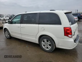 2013 Dodge Grand Caravan Crew with VIN 2C4RDGDG5DR740098, listed as a Copart auction lot 84491644 with 146,400 mi miles and Salvage Title. Bid and sale history available at DreamBid. Image 2.