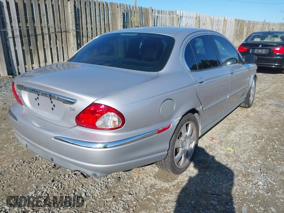 2004 Jaguar X-Type with VIN SAJEA51C94WD62540, listed as a IAAI auction lot 41864020 with 85,713 mi miles. Bid and sale history available at carsss.com. Image 4.