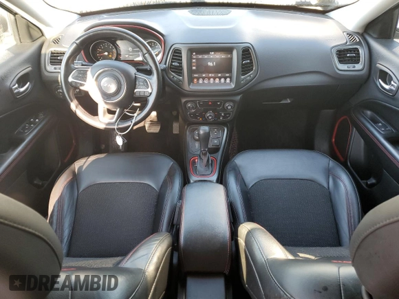 2018 Jeep Compass Trailhawk with VIN 3C4NJDDB9JT451745, listed as a Copart auction lot 61187255 with 88,923 mi miles and Salvage title. Bid and sale history available at DreamBid. Image 8.