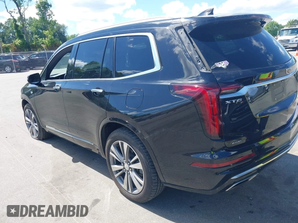 2020 Cadillac XT6 AWD Premium Luxury with VIN 1GYKPDRS2LZ147317, listed as a IAAI auction lot 42345966 with 98,949 mi miles and . Bid and sale history available at DreamBid. Image 3.