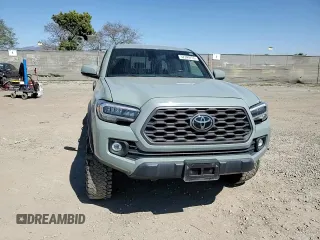 2022 Toyota Tacoma SR z VIN 3TMCZ5AN5NM506941, wystawiony jako Copart lot #52349755 z przebiegiem 46 013 mil mil oraz Szkoda całkowita • Salvage title. Historia ofert i sprzedaży dostępna na DreamBid. Obrazek 11.