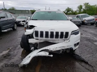2019 Jeep Cherokee Limited z VIN 1C4PJMDX4KD336966, wystawiony jako Copart lot #55577615 z przebiegiem 83 815 mil mil oraz Szkoda całkowita • Salvage title. Historia ofert i sprzedaży dostępna na DreamBid. Obrazek 5.