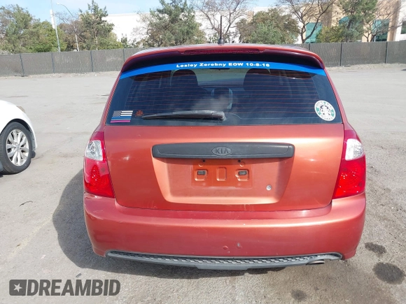 2007 Kia Spectra with VIN KNAFE161275003137, listed as a IAAI auction lot 41697530 with 256,834 mi miles. Bid and sale history available at carsss.com. Image 17.