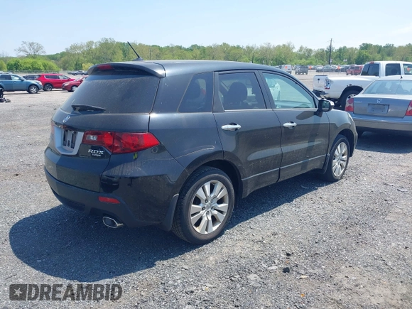 2011 Acura RDX with VIN 5J8TB2H23BA001442, listed as a IAAI auction lot 42165155 with 202,951 mi miles. Bid and sale history available at carsss.com. Image 4.