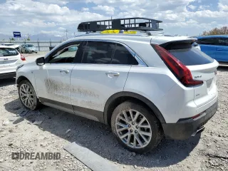 2023 Cadillac XT4 AWD Premium Luxury with VIN 1GYFZDR46PF130198, listed as a Copart auction lot 57763285 with 8,346 mi miles and Salvage title. Bid and sale history available at DreamBid. Image 2.