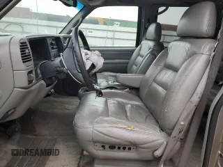 1999 GMC Yukon with VIN 1GKEK13R1XJ740648, listed as a Copart auction lot 82829084 with 211,002 mi miles and Salvage Title. Bid and sale history available at carsss.com. Image 7.