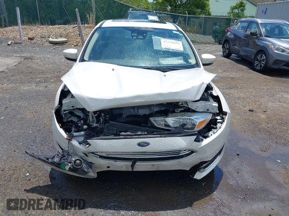 2016 Ford Focus Titanium with VIN 1FADP3N21GL309340, listed as a IAAI auction lot 42518653 with 101,555 mi miles and . Bid and sale history available at DreamBid. Image 6.