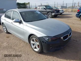 2015 BMW 3 Series 328i with VIN WBA3A5C58FF610035, listed as a IAAI auction lot 40986949 with 73,083 mi miles. Bid and sale history available at carsss.com. Image 1.