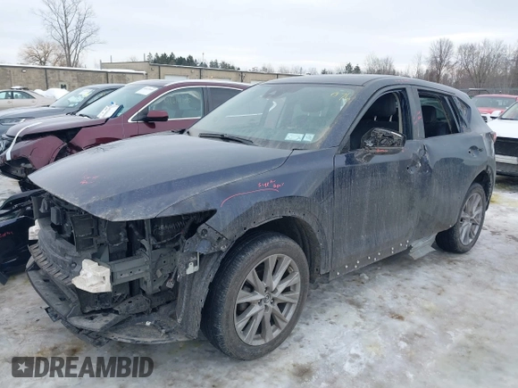 2020 Mazda CX-5 Grand Touring with VIN JM3KFBDM9L0778812, listed as a IAAI auction lot 41589208 with 39,385 mi miles. Bid and sale history available at carsss.com. Image 2.