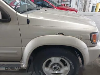 1999 Infiniti QX4 z VIN JNRAR05Y1XW049630, wystawiony jako IAAI lot #42296808 z przebiegiem 247 654 mil mil oraz . Historia ofert i sprzedaży dostępna na DreamBid. Obrazek 6.