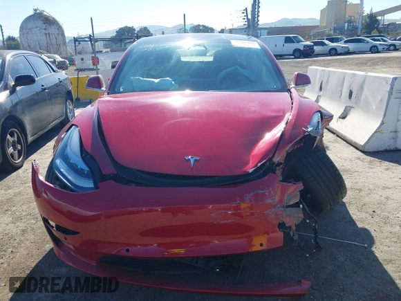 2018 Tesla Model 3 Long Range Battery z VIN 5YJ3E1EA4JF022284, wystawiony jako IAAI lot #41422203 z przebiegiem 71 521 mil mil oraz . Historia ofert i sprzedaży dostępna na DreamBid. Obrazek 11.