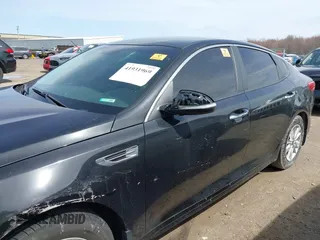 2016 Kia Optima LX with VIN KNAGT4L34G5110742, listed as a IAAI auction lot 41931969 with 128,458 mi miles. Bid and sale history available at carsss.com. Image 15.