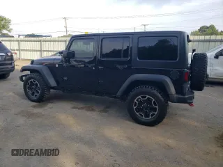 2016 Jeep Wrangler Unlimited Rubicon with VIN 1C4HJWFG9GL220687, listed as a Copart auction lot 60552705 with 49,525 mi miles and Salvage title. Bid and sale history available at DreamBid. Image 2.