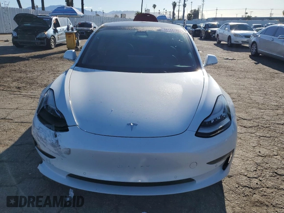 2020 Tesla Model 3 Standard Range Plus with VIN 5YJ3E1EA5LF660417, listed as a Copart auction lot 48144125 with 112,924 mi miles and Salvage Title. Bid and sale history available at DreamBid. Image 5.