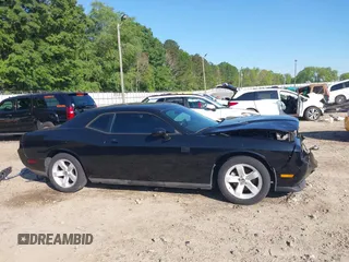 2013 Dodge Challenger SXT z VIN 2C3CDYAG4DH718894, wystawiony jako IAAI lot #42156336 z przebiegiem 153 000 mil mil oraz . Historia ofert i sprzedaży dostępna na DreamBid. Obrazek 13.