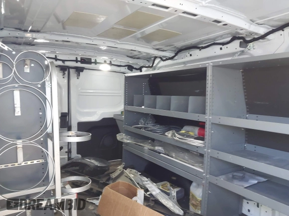 2020 Ford Transit Cargo z VIN 1FTBR1Y84LKB79621, wystawiony jako IAAI lot #41802213 z przebiegiem 89 167 mil mil oraz . Historia ofert i sprzedaży dostępna na DreamBid. Obrazek 8.