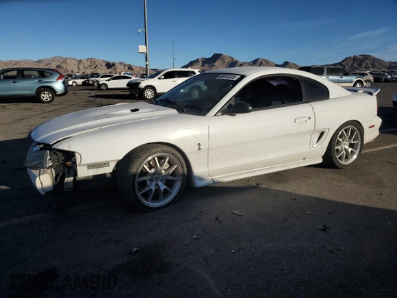 1997 Ford Mustang Cobra with VIN 1FALP47VXVF139807, listed as a Copart auction lot 88045305 with 113,571 mi miles and Salvage Title. Bid and sale history available at carsss.com. Image 1.