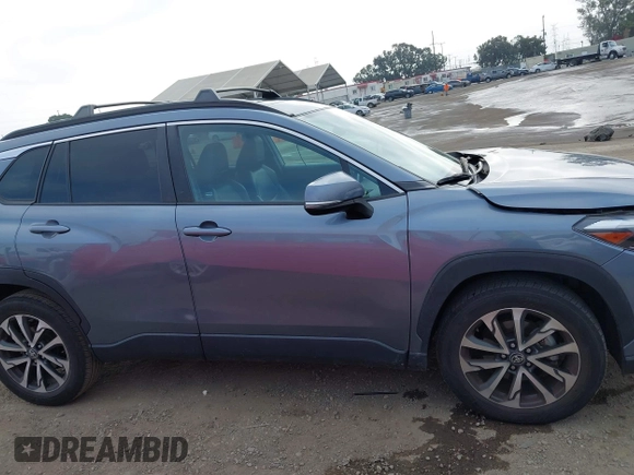 2022 Toyota Corolla Cross XLE with VIN 7MUDAABG6NV007009, listed as a IAAI auction lot 42409061 with 37,178 mi miles and . Bid and sale history available at DreamBid. Image 14.
