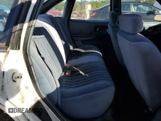 1995 Buick Regal Custom с VIN 2G4WB52M5S1425279, выставлен на аукционе Copart как лот 80939374 с пробегом 151 906 миль миль и Списание • Salvage title. История ставок и продаж доступна на DreamBid. Изображение 10.