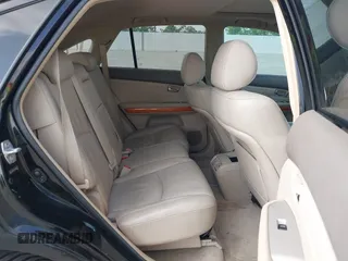 2008 Lexus RX with VIN 2T2HK31U38C064322, listed as a IAAI auction lot 42074366 with 241,459 mi miles. Bid and sale history available at carsss.com. Image 8.