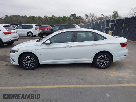2019 Volkswagen Jetta SEL z VIN 3VWE57BU4KM248989, wystawiony jako IAAI lot #41465186 z przebiegiem 41 985 mil mil oraz . Historia ofert i sprzedaży dostępna na DreamBid. Obrazek 14.