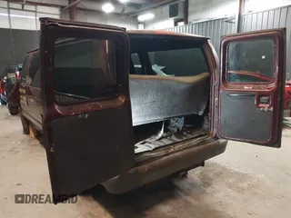 2004 Ford Econoline Cargo with VIN 1FTRE14WX4HA29431, listed as a IAAI auction lot 41651440 with 247,750 mi miles. Bid and sale history available at carsss.com. Image 3.