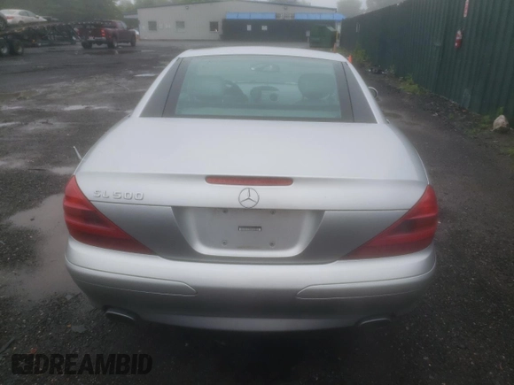 2005 Mercedes-Benz SL 500 with VIN WDBSK75F05F094991, listed as a Copart auction lot 61678705 with 128,123 mi miles and Clean title. Bid and sale history available at DreamBid. Image 6.
