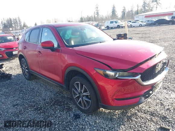 2018 Mazda CX-5 Touring with VIN JM3KFBCM8J0472991, listed as a IAAI auction lot 41959737 with 82,843 mi miles. Bid and sale history available at carsss.com. Image 1.