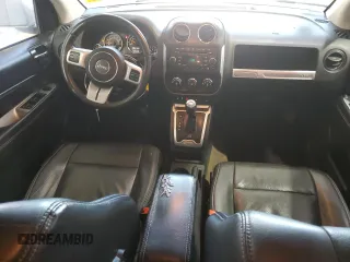 2017 Jeep Compass Latitude with VIN 1C4NJDEB4HD128749, listed as a Copart auction lot 53892245 with 123,549 mi miles and Salvage title. Bid and sale history available at DreamBid. Image 8.