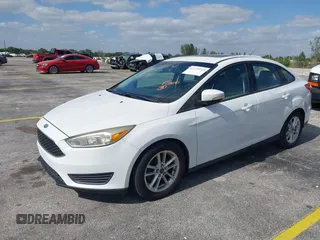 2015 Ford Focus SE with VIN 1FADP3F23FL329375, listed as a IAAI auction lot 42170945 with 114,180 mi miles. Bid and sale history available at carsss.com. Image 2.